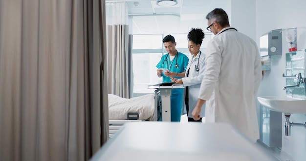 Healthcare hospital and a medical team of doctors checking on a patient in recovery or rehabilitation Medicine teamwork and consulting with a group of health professionals in a clinic for wellness