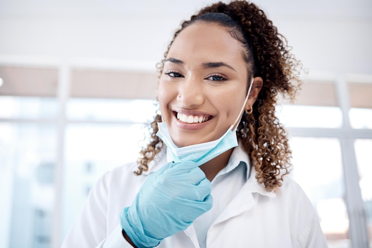 Photo healthcare mask and portrait of dentist with smile for medical care dental consultation and wellness safety dentistry and face of woman orthodontist for teeth whitening oral surgery and hygiene