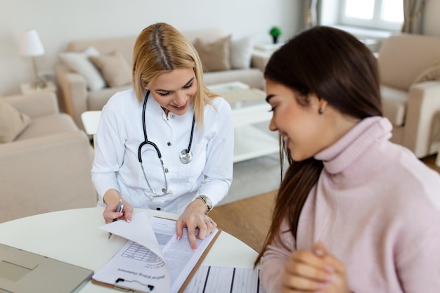 Healthcare and medical concept doctor with patient in hospital Doctor working in the office and listening to the patient she is explaining her symptoms healtcare and assistance concept