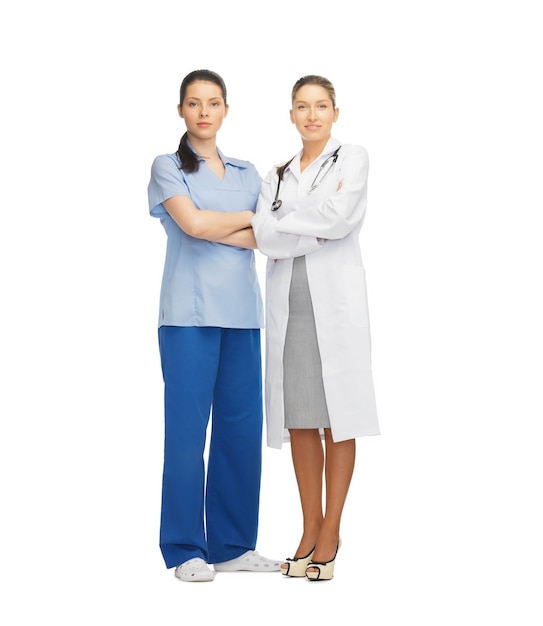 healthcare and medical concept - two doctors in uniform