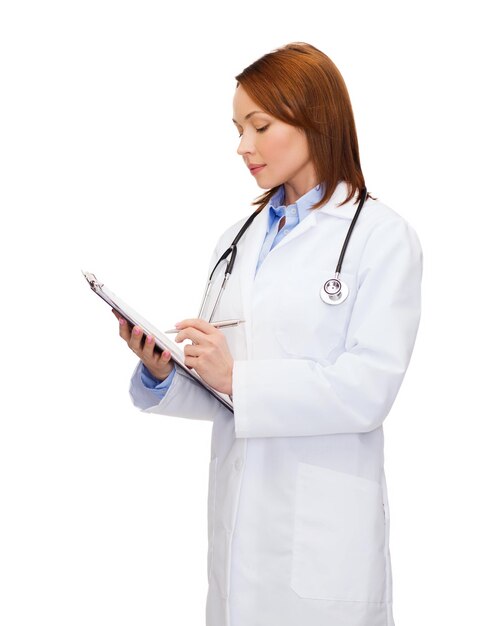 healthcare and medicine concept - calm female doctor with clipboard and stethoscope