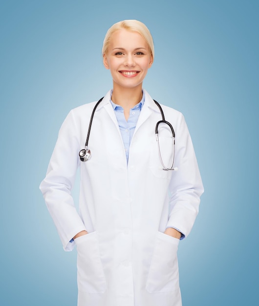 healthcare and medicine concept - smiling female doctor with stethoscope