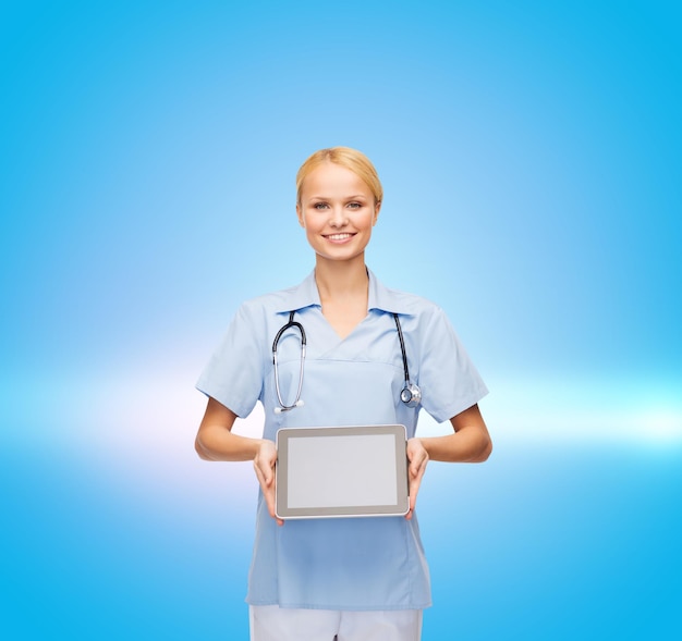 Healthcare, medicine and technology concept - smiling female doctor or nurse with tablet pc computer