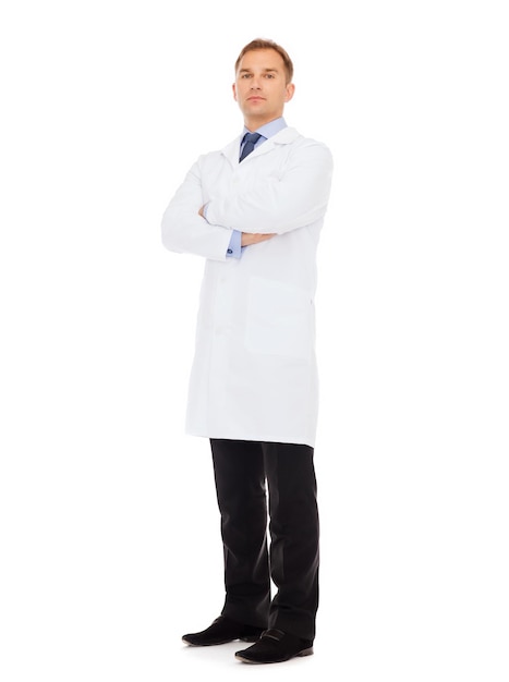 healthcare, profession and medicine concept - male doctor in white coat over white background