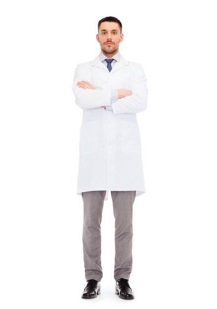 healthcare, profession and medicine concept - male doctor in white coat over white background