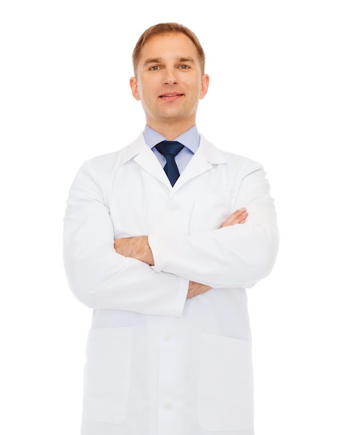 healthcare, profession and medicine concept - smiling male doctor in white coat over white background