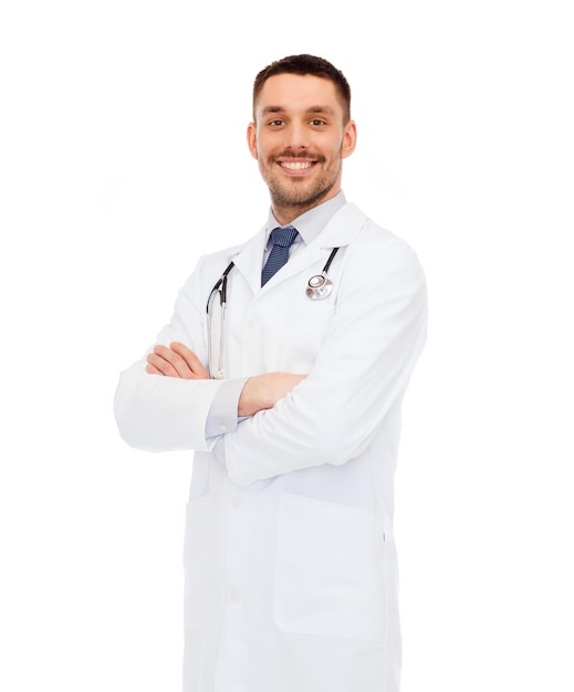 healthcare, profession and medicine concept - smiling male doctor with stethoscope in white coat over white background