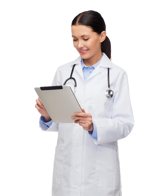 healthcare, technology and medicine concept - smiling female doctor with stethoscope and tablet pc computer