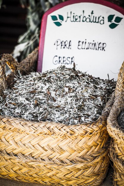 Healthcare, wicker baskets stuffed medicinal healing herbs