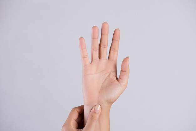 Healthcare . Woman massaging her painful hand.