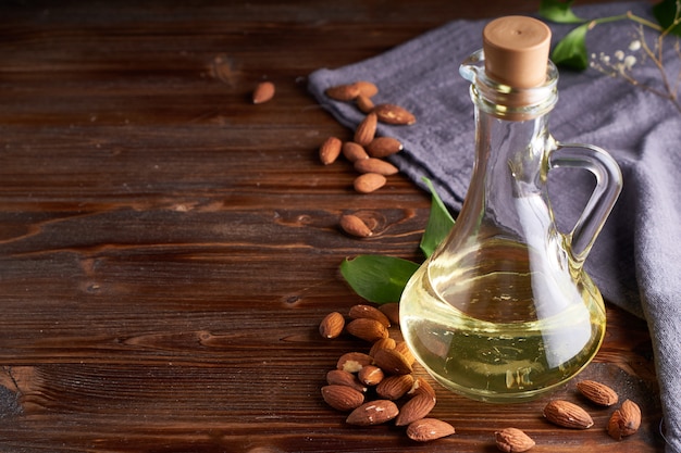 Healthy Almond oil in glass bottle.