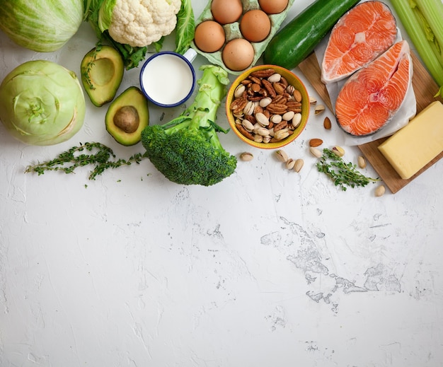 Healthy balanced food on a white marble surface