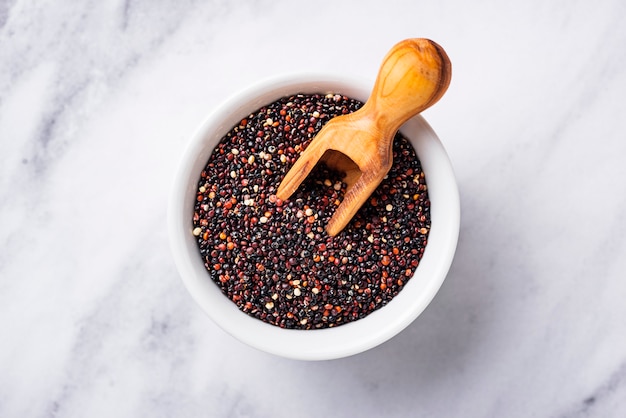 Healthy black quinoa seeds in bowl