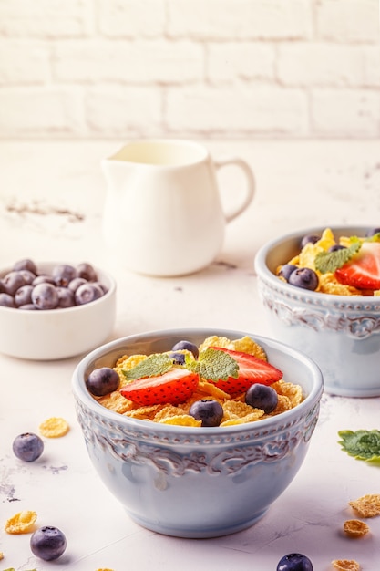 Healthy breakfast - corn flakes with fruits and berries