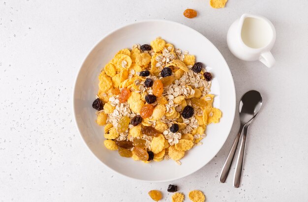 Healthy breakfast, diet culture. Fresh granola, muesli with raisins. Copy space