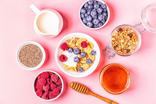 Healthy breakfast, muesli, cereal with fruit, top view.