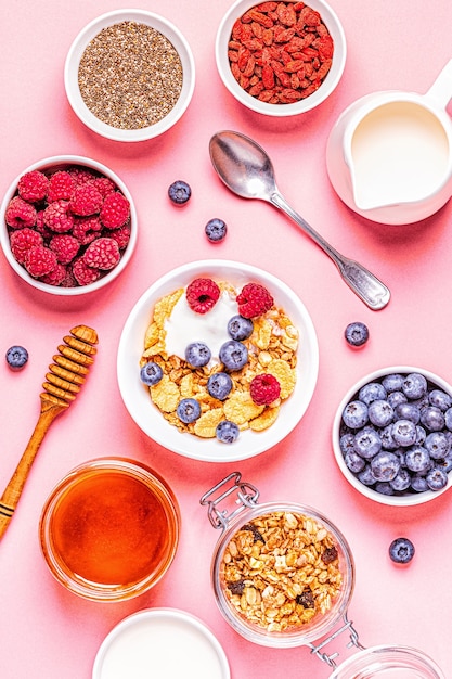 Healthy breakfast, muesli, cereal with fruit, top view.