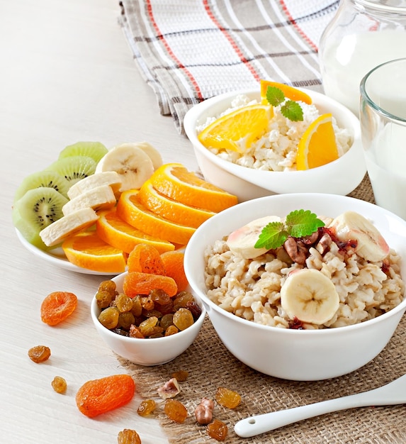 Healthy breakfast oatmeal cottage cheese milk and fruit