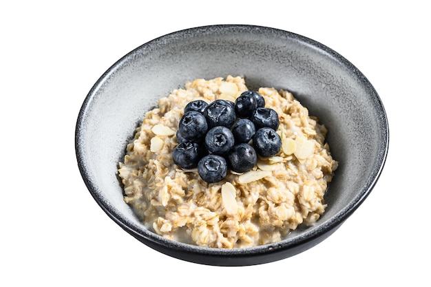 Healthy breakfast Oatmeal porridge with blueberries Isolated on white background