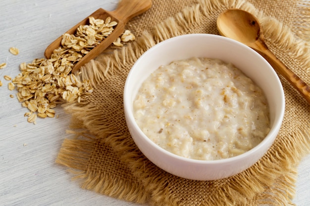 Healthy Breakfast. Oatmeal in a white bowl