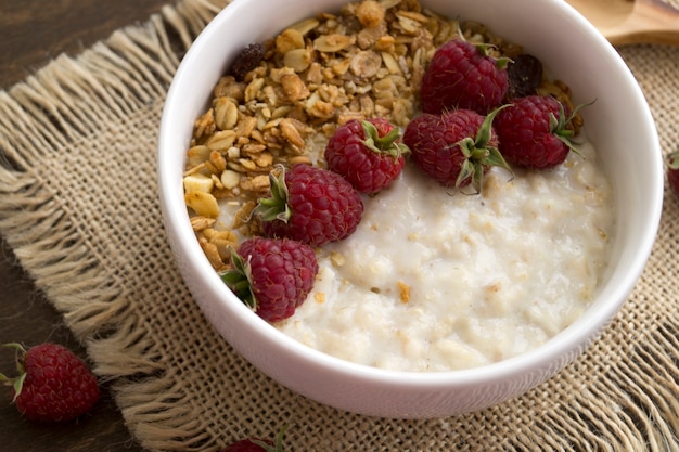 Healthy Breakfast. Oatmeal in a white bowl