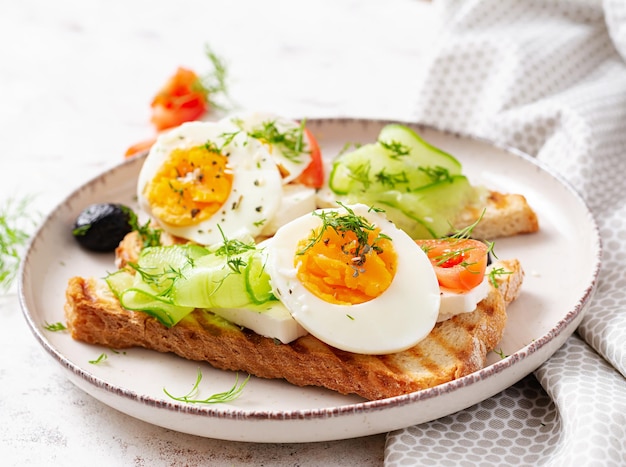 Healthy breakfast Toast with feta cheese and egg Healthy balanced food