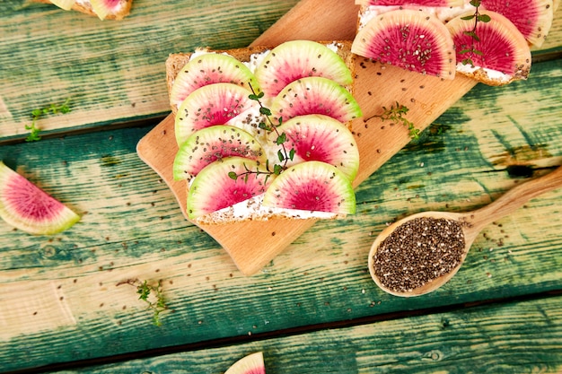 Healthy breakfast toasts from sliced watermelon radish