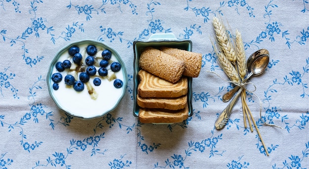 Healthy Breakfast with blueberries and banana yogurt