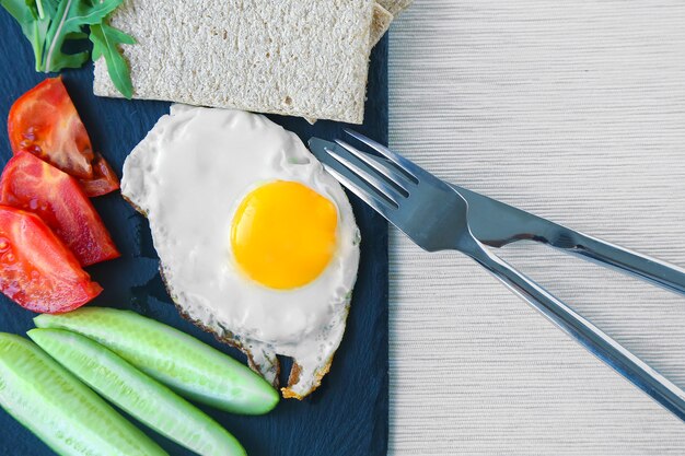 Healthy breakfast with egg and vegetables