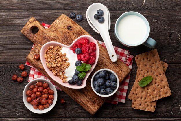 Healthy breakfast with granola yogurt and berries