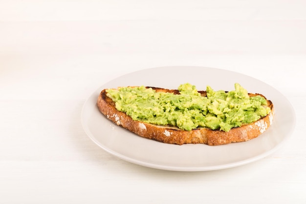 Healthy Breakfast with smashed Avocado on Wholemeal Bread Toast