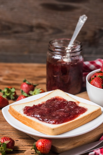 Healthy breakfast with strawberry jam 