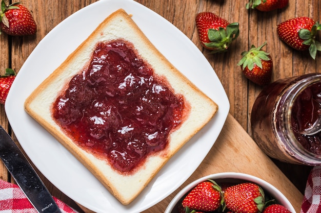 Healthy breakfast with strawberry jam 