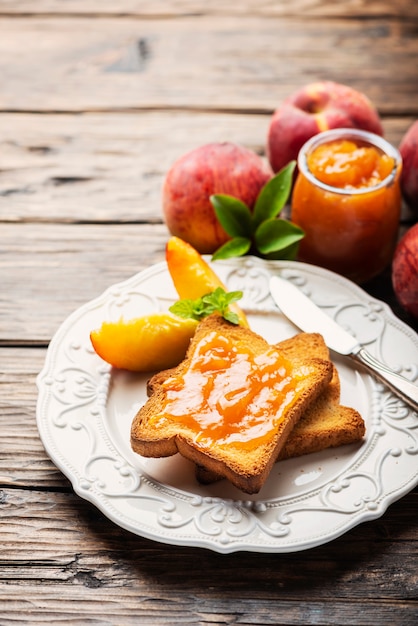 Healthy breakfast with toast and peach jam