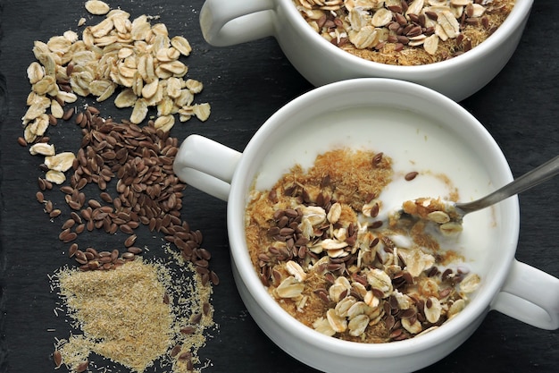 Healthy breakfast with yogurt bran and seeds Healthy food Diet food