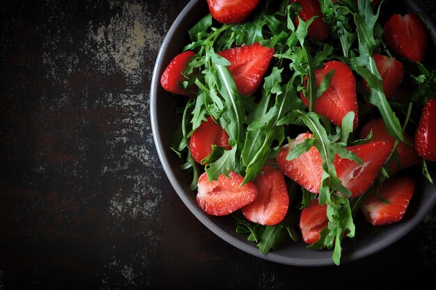 Healthy bright arugula salad strawberry Vegan Salad