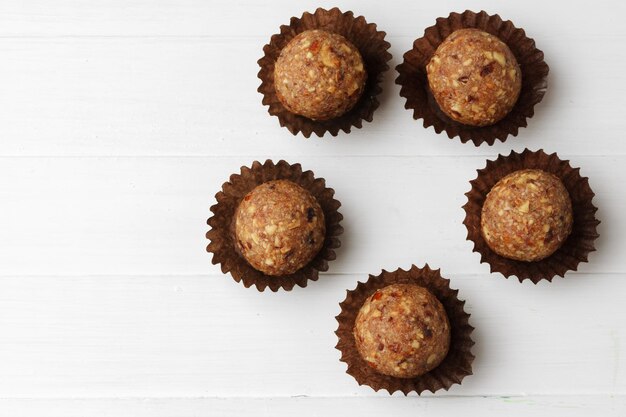 Photo healthy candies on white background close up