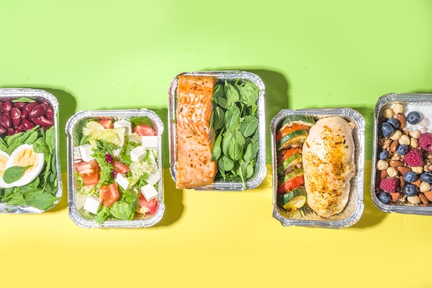 Healthy catering menu, courier food delivery lunch boxes. beef\
steak meat, chicken filet , fish and vegetables in packages. daily\
meal diet plan delivery , take away containers, online order\
concept