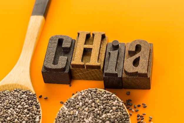 Healthy Chia seeds with chia wooden sign close-up.