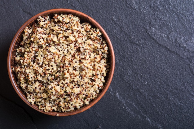 Healthy colorful cooked quinoa Superfood background