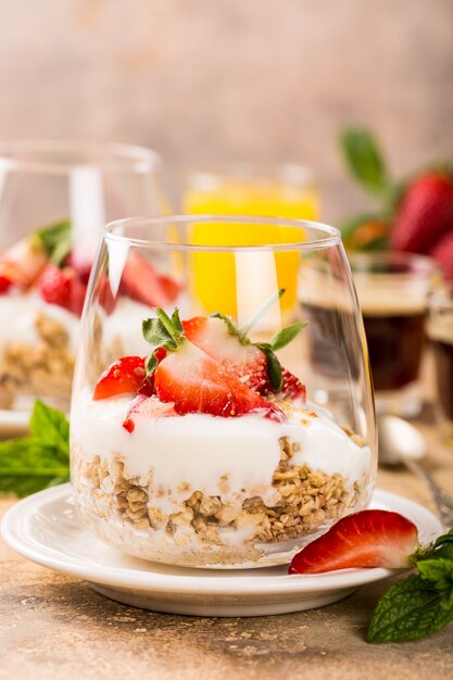 Healthy dessert with granola and berries