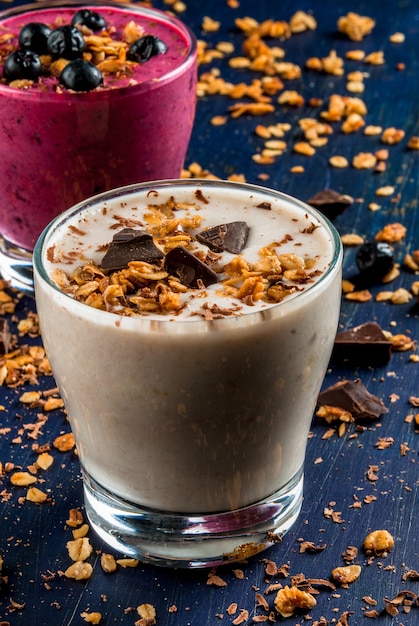 Healthy dessert of yogurt, smoothies, granola, chocolate