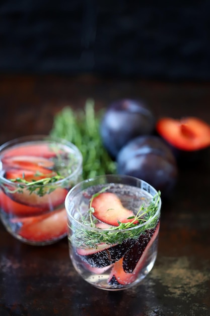 Healthy detox drink plum thyme Mineral water with thyme and plum