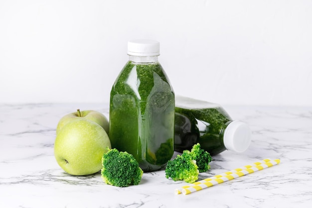 Healthy Detox Green Smoothie with Green Apples and Ripe Broccoli in Bottles Healthy Diet Food Drink