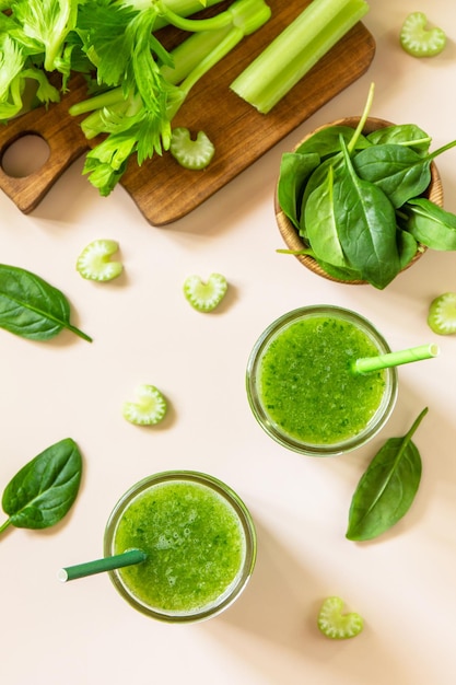 Healthy diet and nutrition vegan and alkaline drink Green fresh smoothie with celery and spinach.