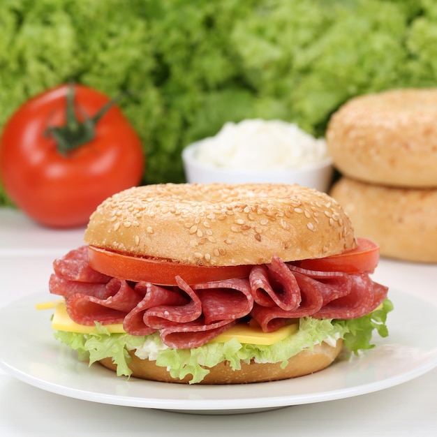 Healthy eating bagel for breakfast with salami ham