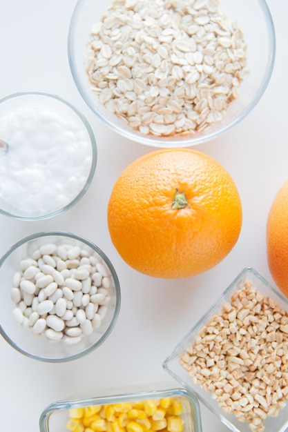 Healthy eating, breakfast, diet and culinary concept - close up of food ingredients on table