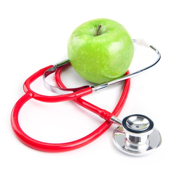 healthy eating concept stethoscope and green apple
