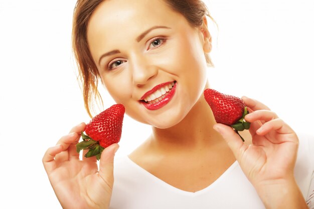 Healthy eating, food and diet concept - Young beautiful happy smiling woman with strawberry