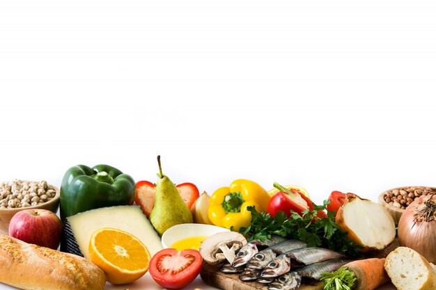 Healthy eating. Mediterranean diet. Fruit,vegetables, grain, nuts olive oil and fish on white